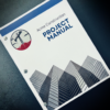 Project manual on black table